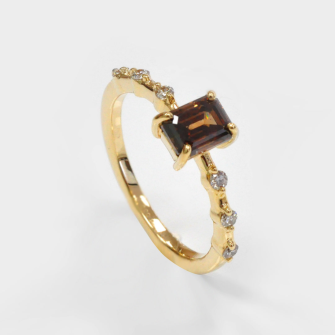 Delicate Emerald cut Diamond and 6 Side Diamonds Ring