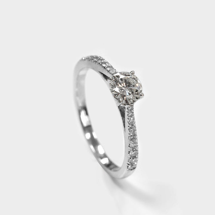 classic side stones elevated shank engagement ring