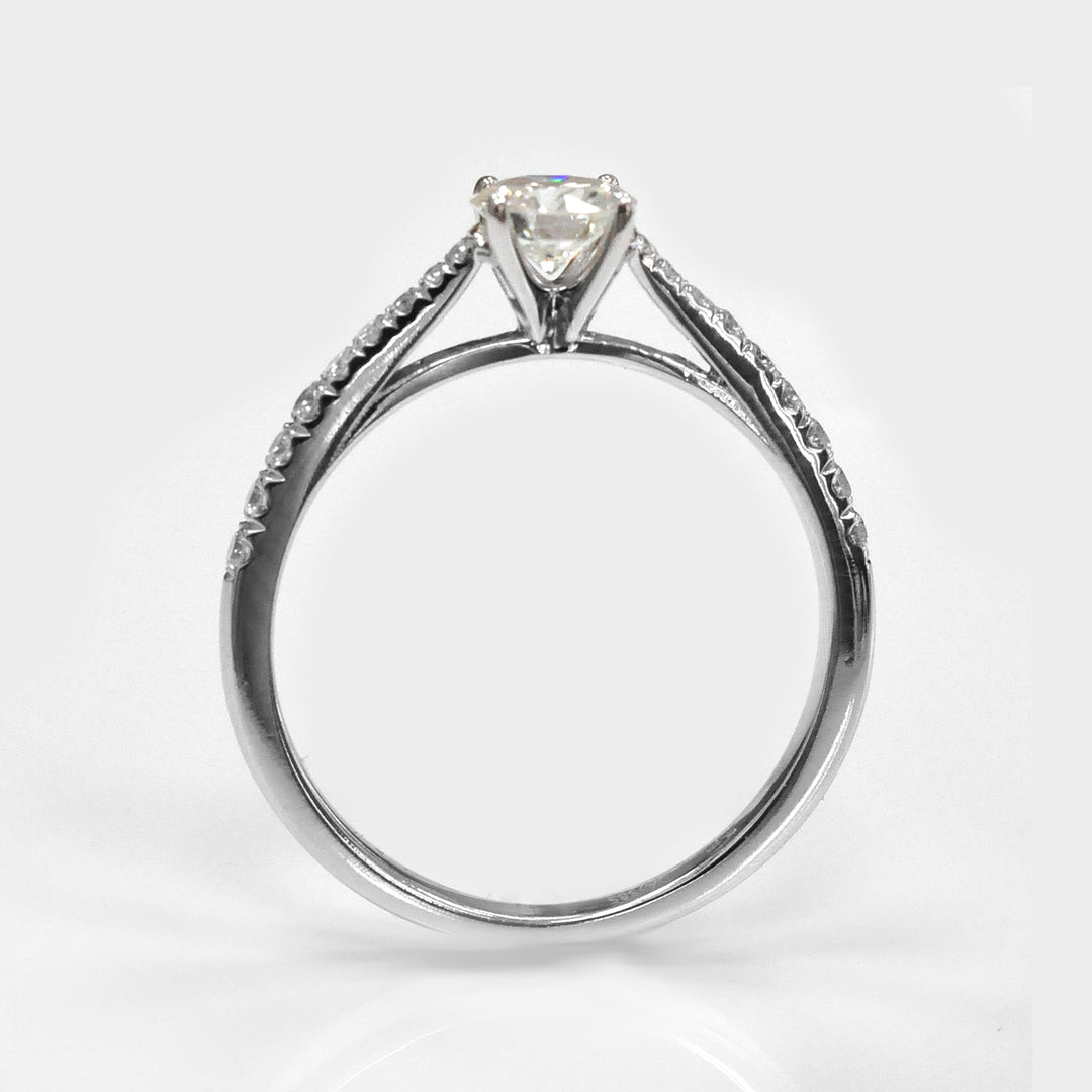 classic side stones elevated shank engagement ring