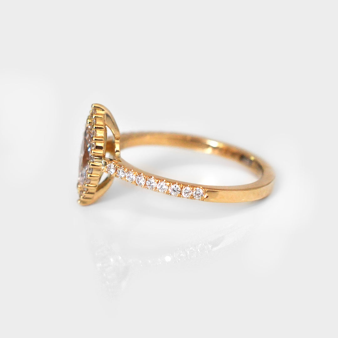 Light Pink Marquise Diamond Ring and White Diamonds Halo