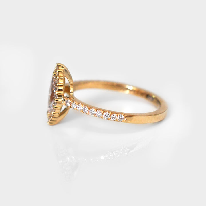 Light Pink Marquise Diamond Ring and White Diamonds Halo