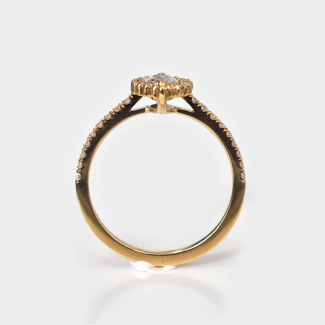 Light Pink Marquise Diamond Ring and White Diamonds Halo
