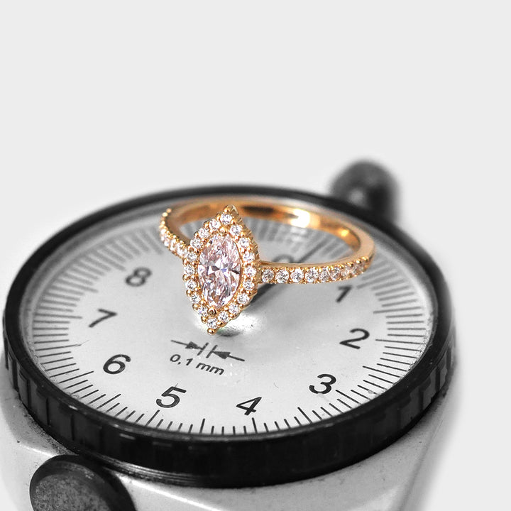 Light Pink Marquise Diamond Ring and White Diamonds Halo
