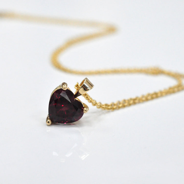 Garnet Heart Shape Pendant in Yellow Gold