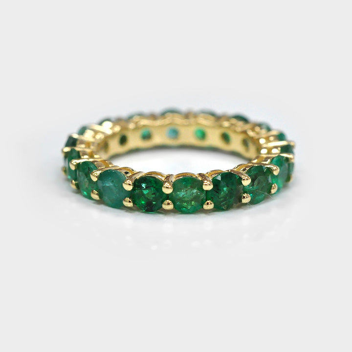 Green Emerald Yellow Gold Eternity Ring