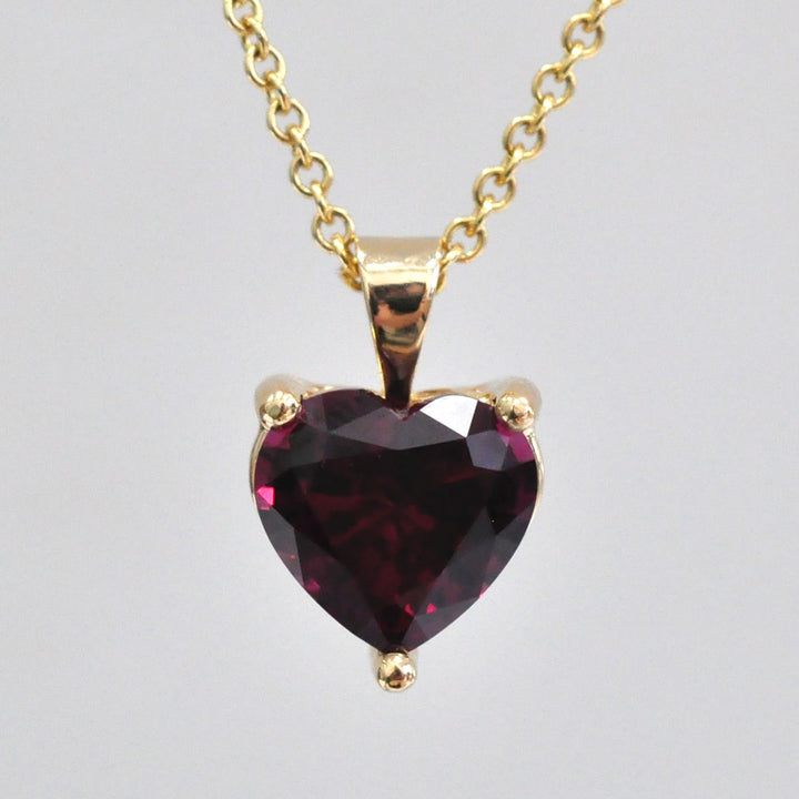 Garnet Heart Shape Pendant in Yellow Gold