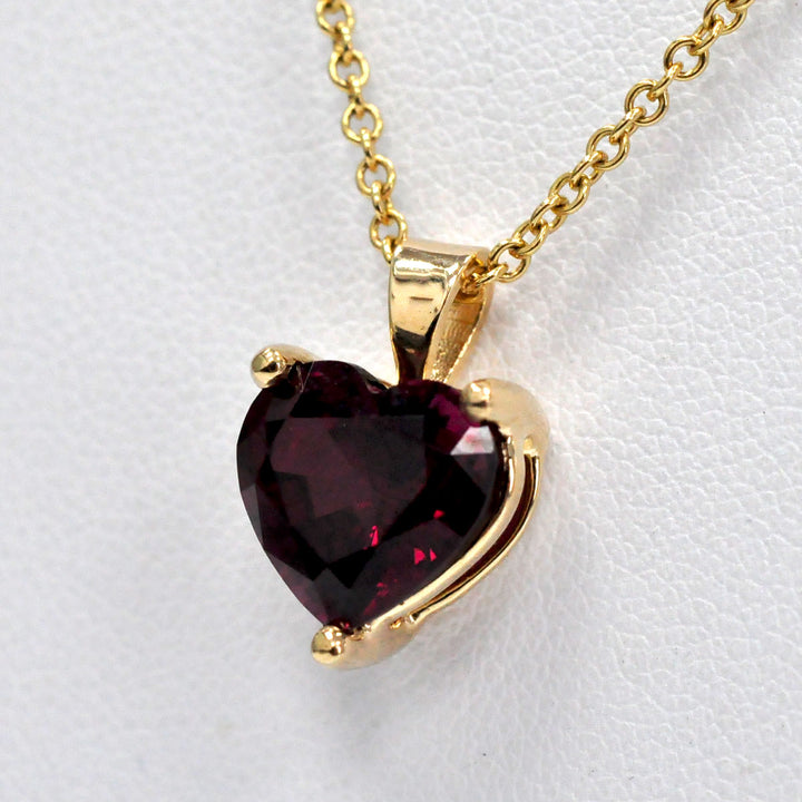 Garnet Heart Shape Pendant in Yellow Gold