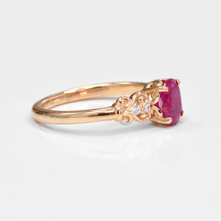 Oval Cut Ruby and Four Side Diamonds Ring