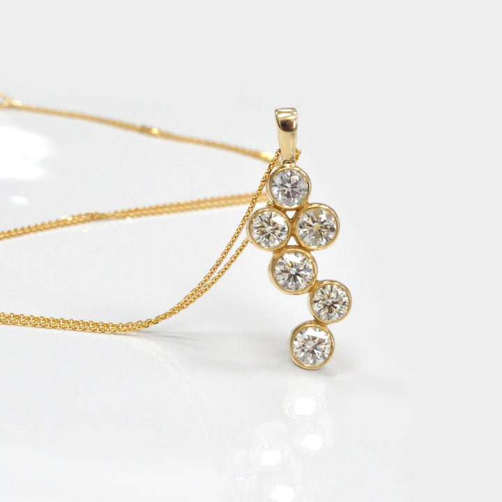 Six Diamonds Bezel Set Pendant in Yellow Gold