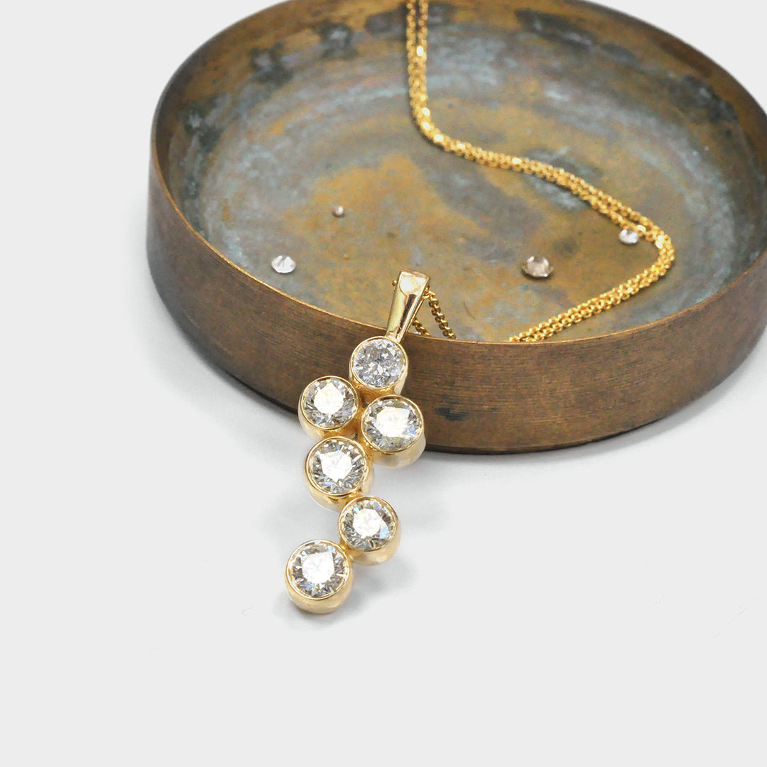 Six Diamonds Bezel Set Pendant in Yellow Gold