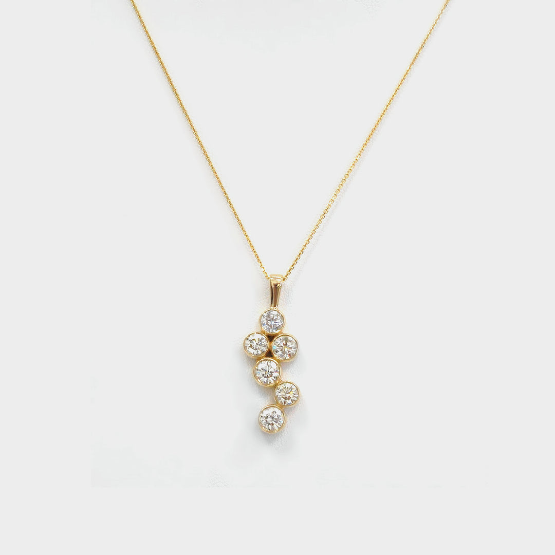 Six Diamonds Bezel Set Pendant in Yellow Gold