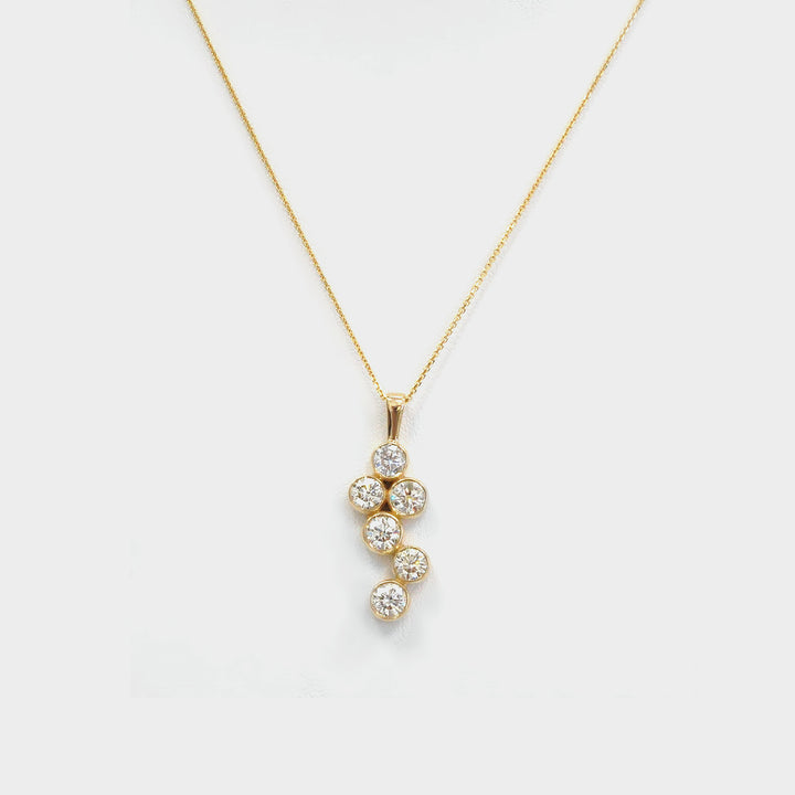 Six Diamonds Bezel Set Pendant in Yellow Gold