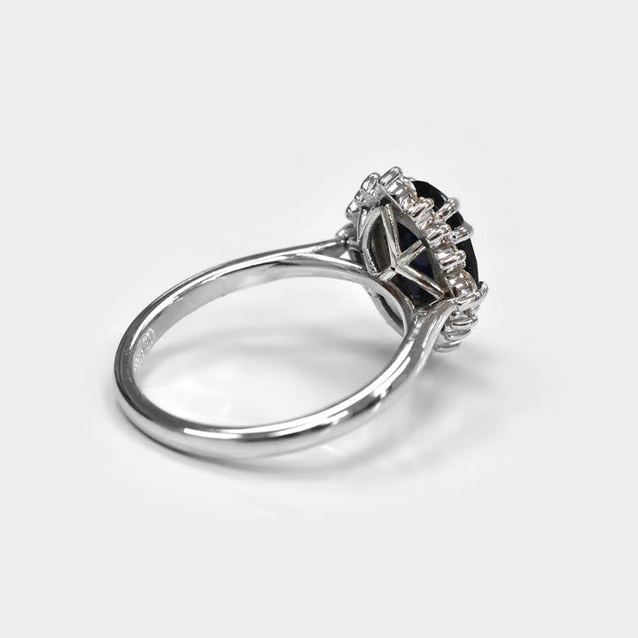 Oval Cut Deep Blue Sapphire and white Diamonds Ring