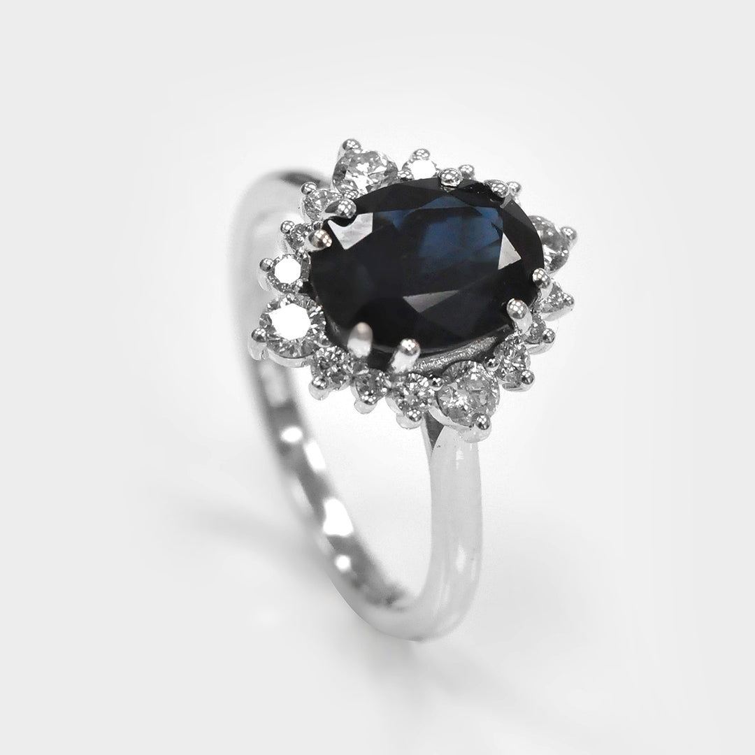Oval Cut Deep Blue Sapphire and white Diamonds Ring