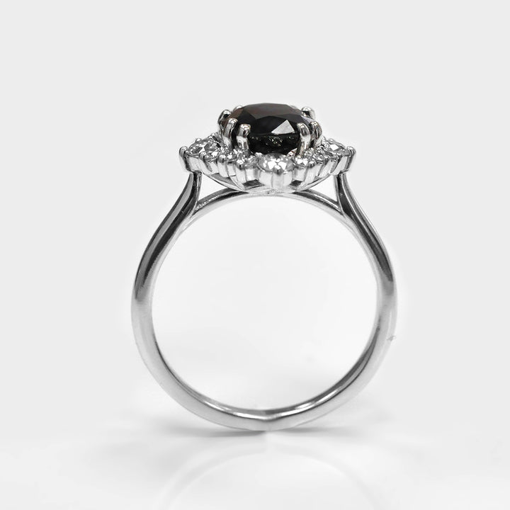 Oval Cut Deep Blue Sapphire and white Diamonds Ring