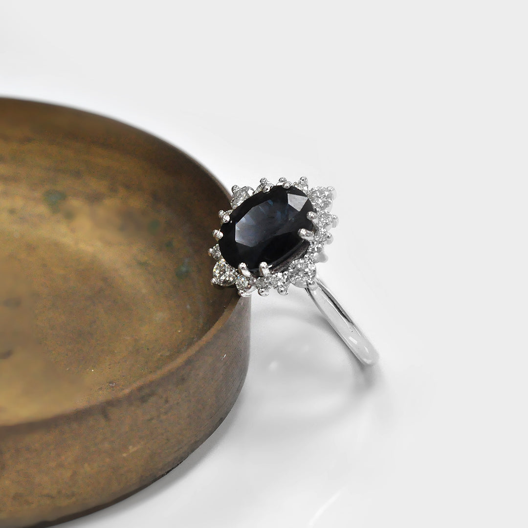 Oval Cut Deep Blue Sapphire and white Diamonds Ring