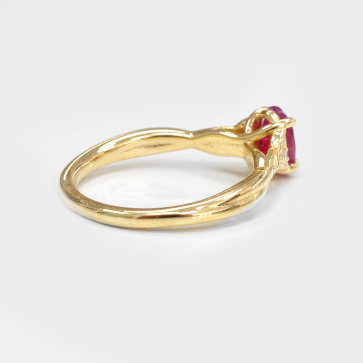 Ruby and Two small Side Diamonds Ring in 18K Yellow Gold