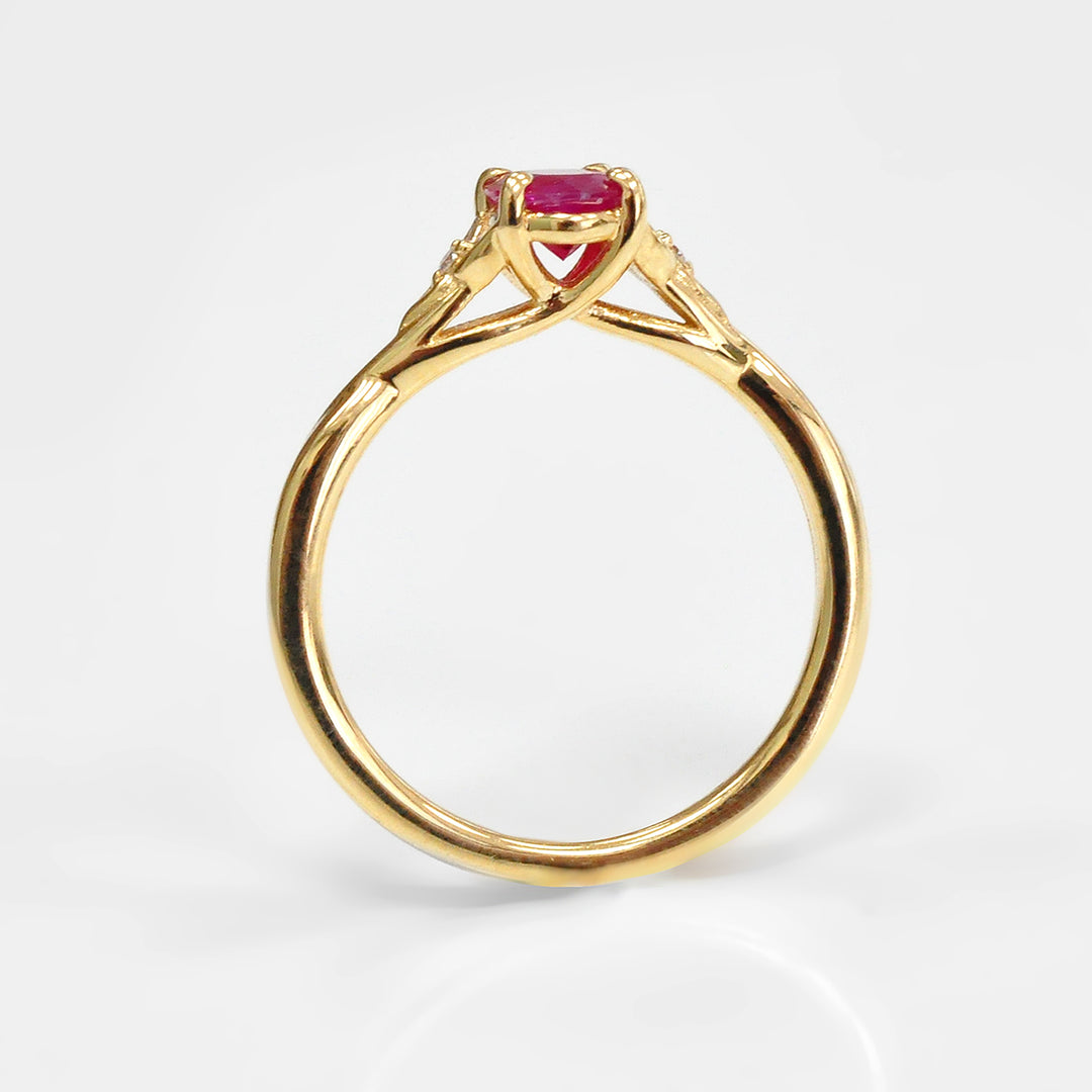Ruby and Two small Side Diamonds Ring in 18K Yellow Gold