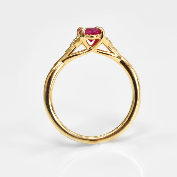 Ruby and Two small Side Diamonds Ring in 18K Yellow Gold