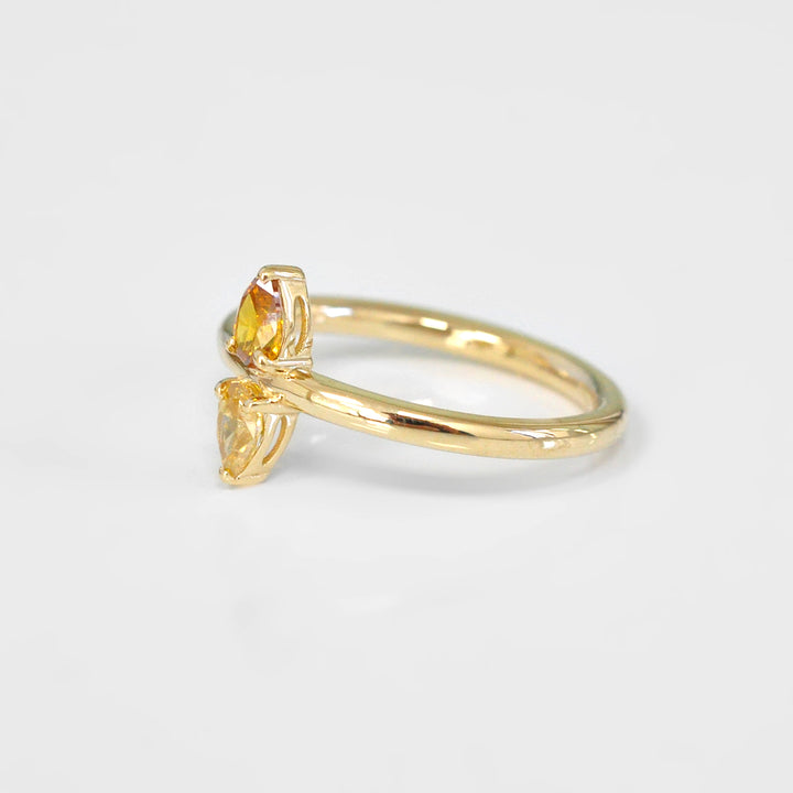 Double Pear Shape Yellow and Orange Diamonds Ring