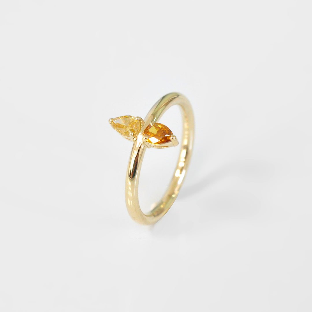 Double Pear Shape Yellow and Orange Diamonds Ring