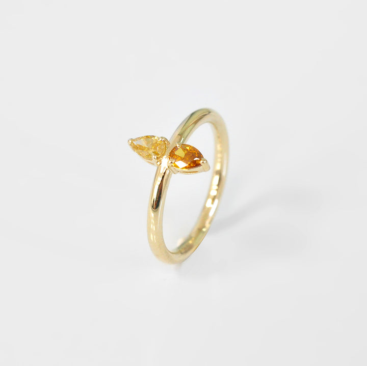 Double Pear Shape Yellow and Orange Diamonds Ring