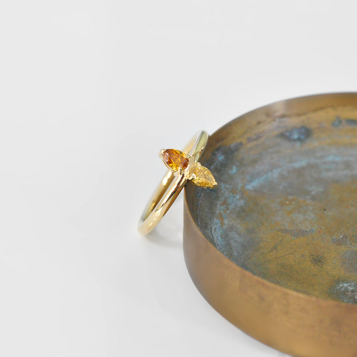 Double Pear Shape Yellow and Orange Diamonds Ring