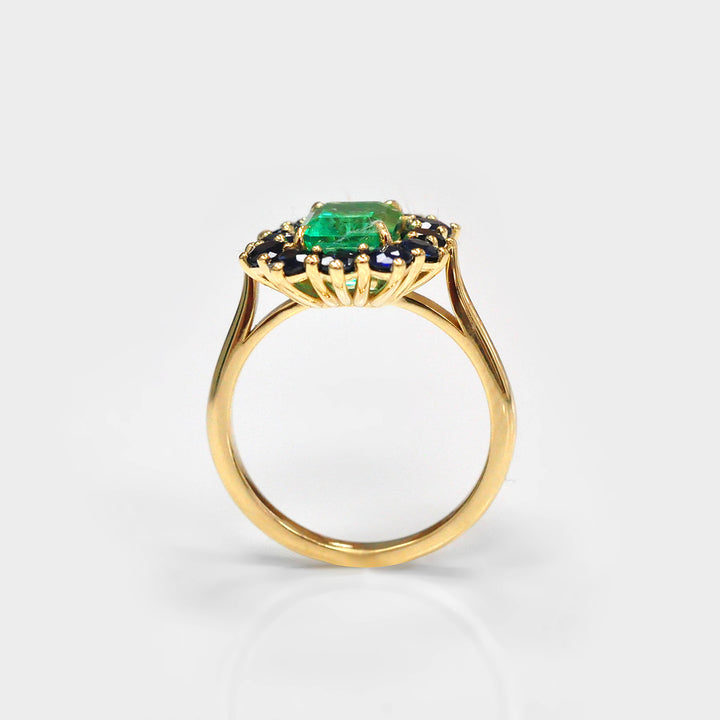Emerald and Blue Sapphires Halo Ring in Yellow Gold
