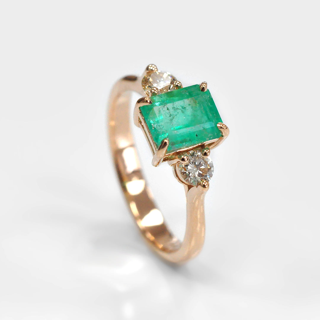 Green Emerald and Six Side Diamonds Rose Gold Ring