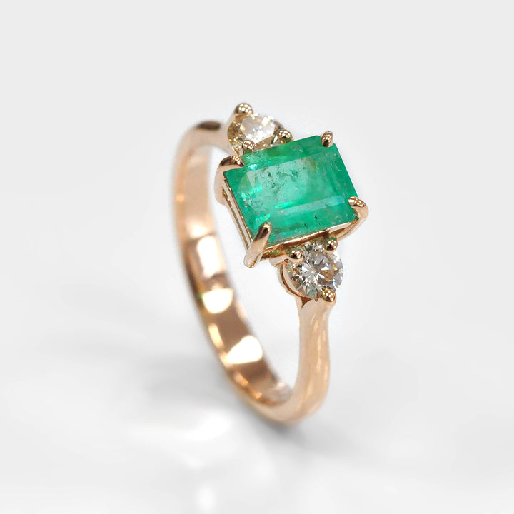 Green Emerald and Six Side Diamonds Rose Gold Ring