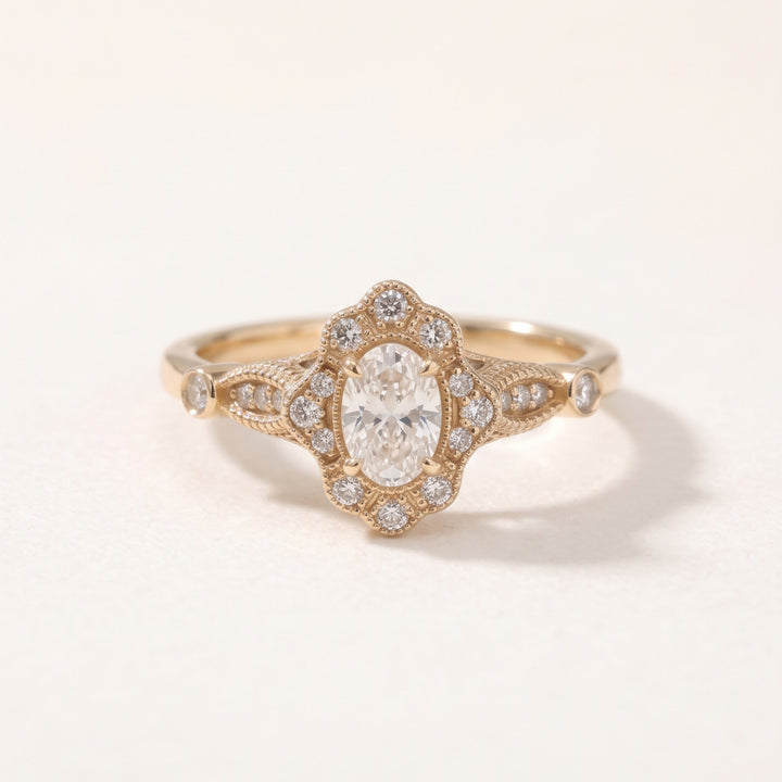 Vintage oval diamond halo ring in 14K rose gold / טבעת יהלום אובלי בהילה בסגנון וינטג׳ בזהב ורוד 14K - Front view / מבט מלפנים