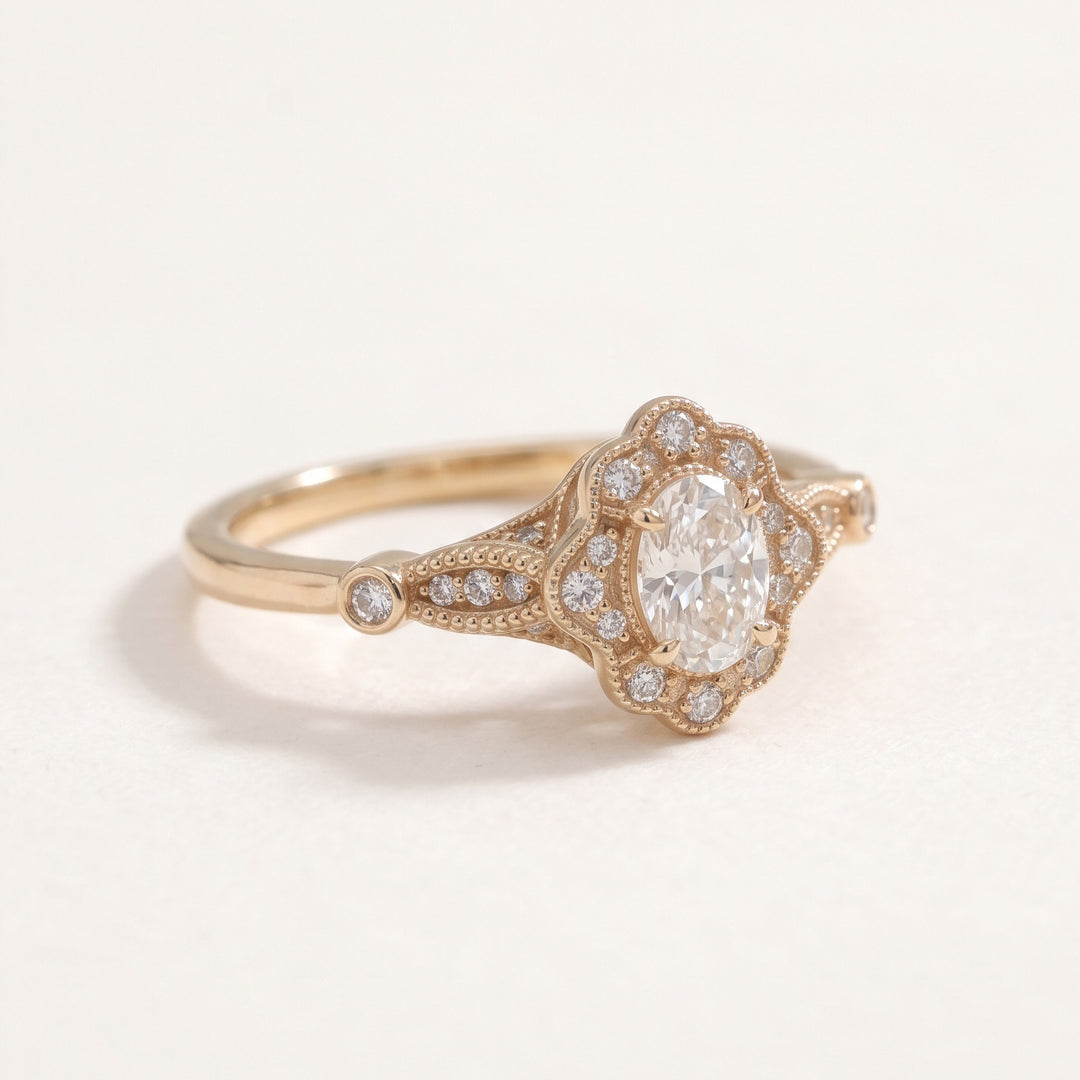 Vintage oval diamond halo ring in 14K rose gold / טבעת יהלום אובלי בהילה בסגנון וינטג׳ בזהב ורוד 14K - Opposite angle / מבט מהצד השני
