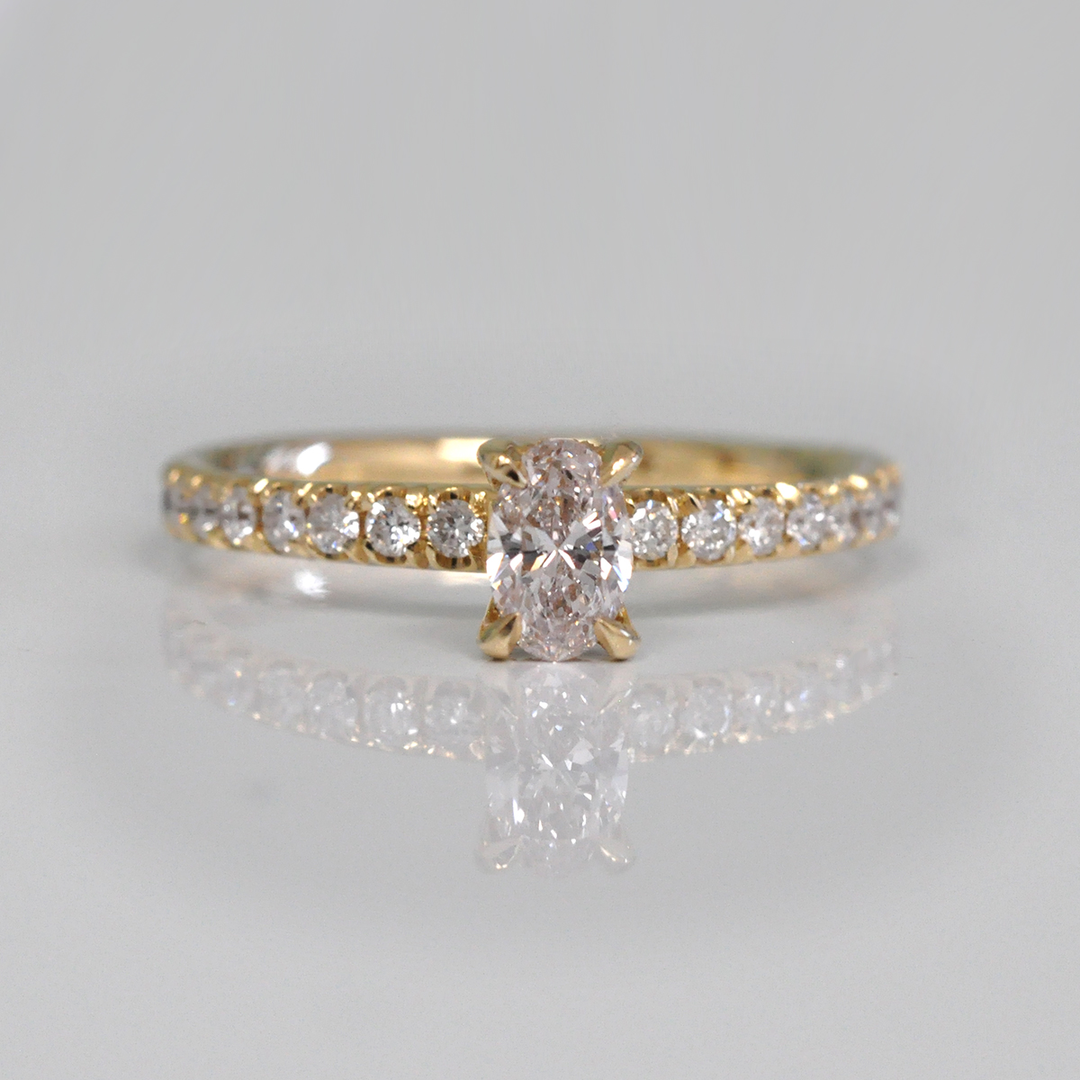 0.30 ct faint pink oval diamond yellow gold engagement ring