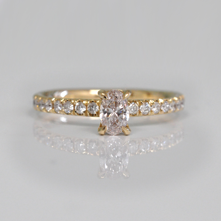 0.30 ct faint pink oval diamond yellow gold engagement ring