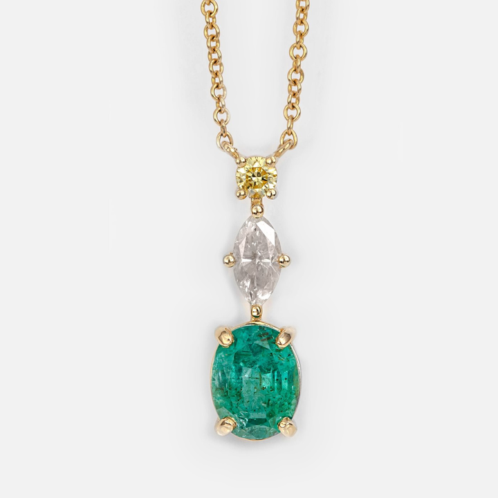Oval shape Emerald and two Diamonds Pendant