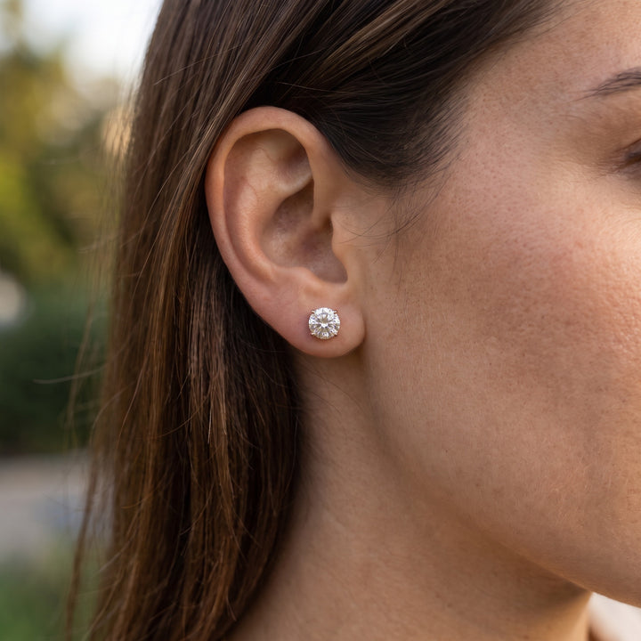 Martini natural diamond stud earring in 14K rose gold — worn on ear