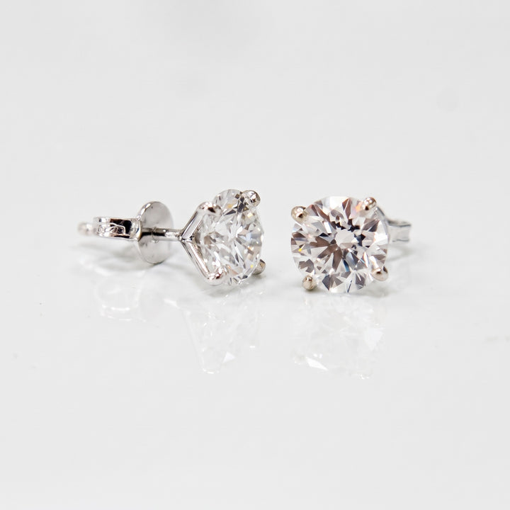 Lightweight martini natural diamond stud earrings in 14K white gold — side view and butterfly backs