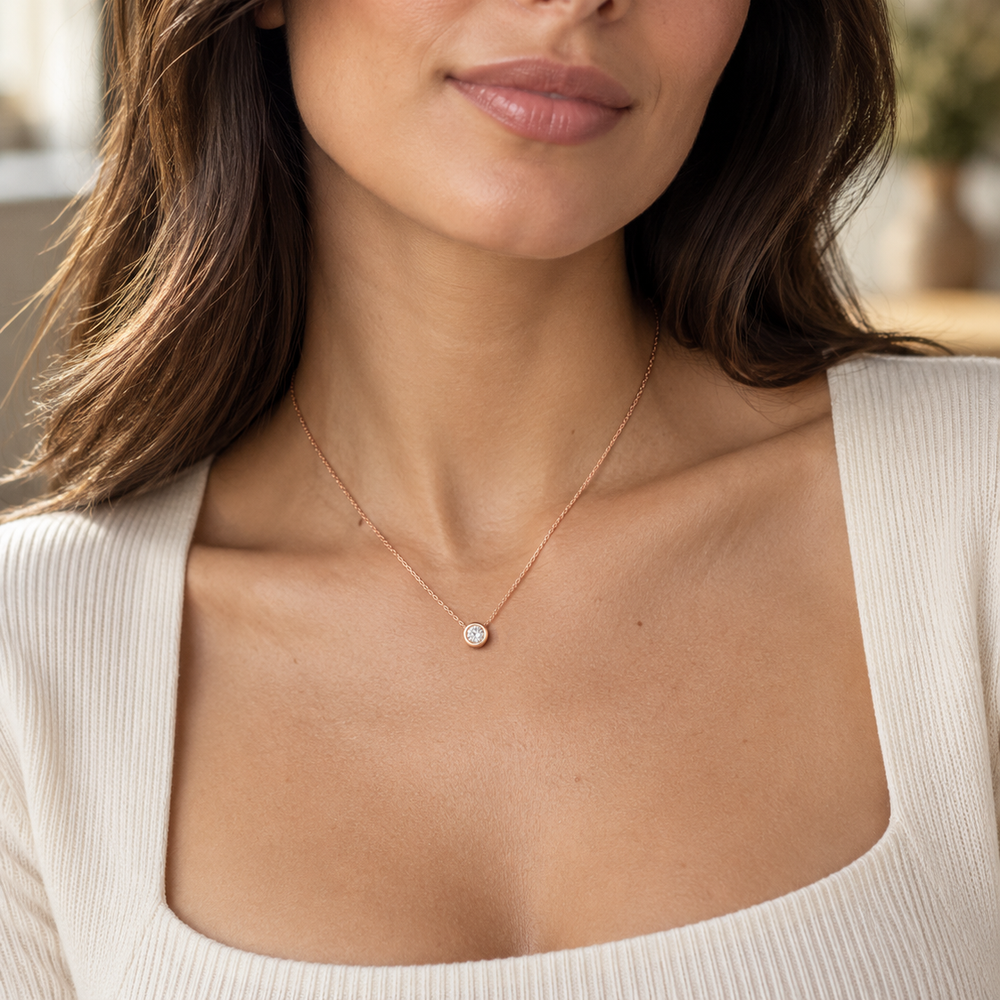 Rose gold bezel set diamond pendant