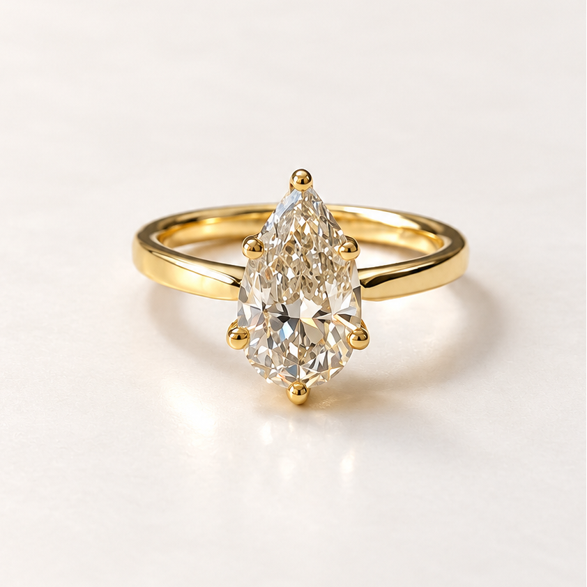 Pear diamond solitaire ring in 14K yellow gold — RS07814