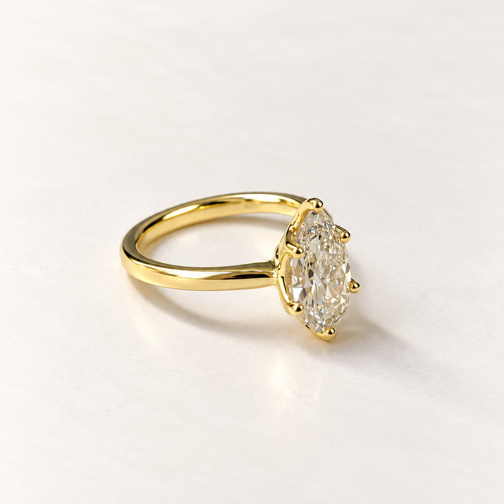 Pear diamond solitaire ring in 14K yellow gold — RS07814