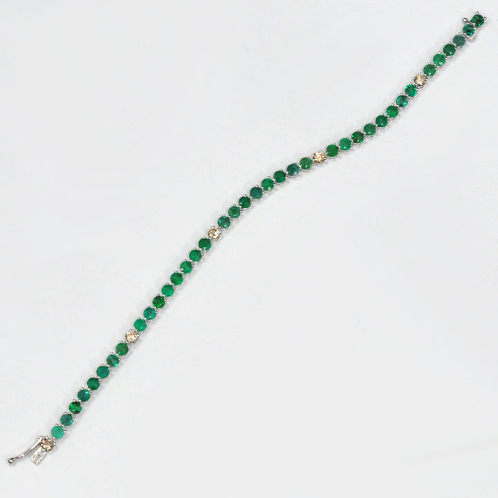 White Gold Emeralds &amp; brown diamonds bracelet.