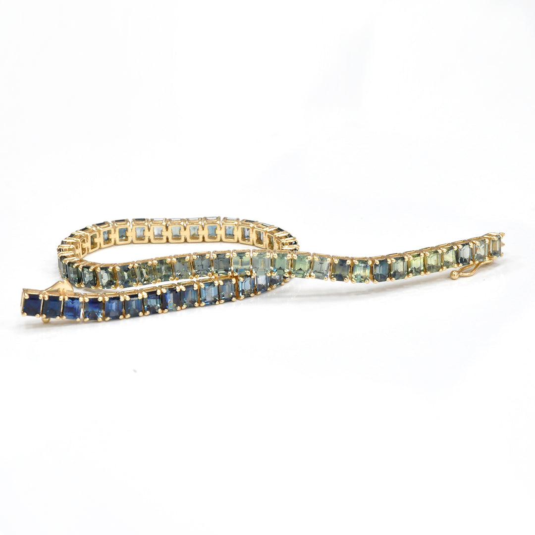 Emerald cut sapphire green to blue bracelet