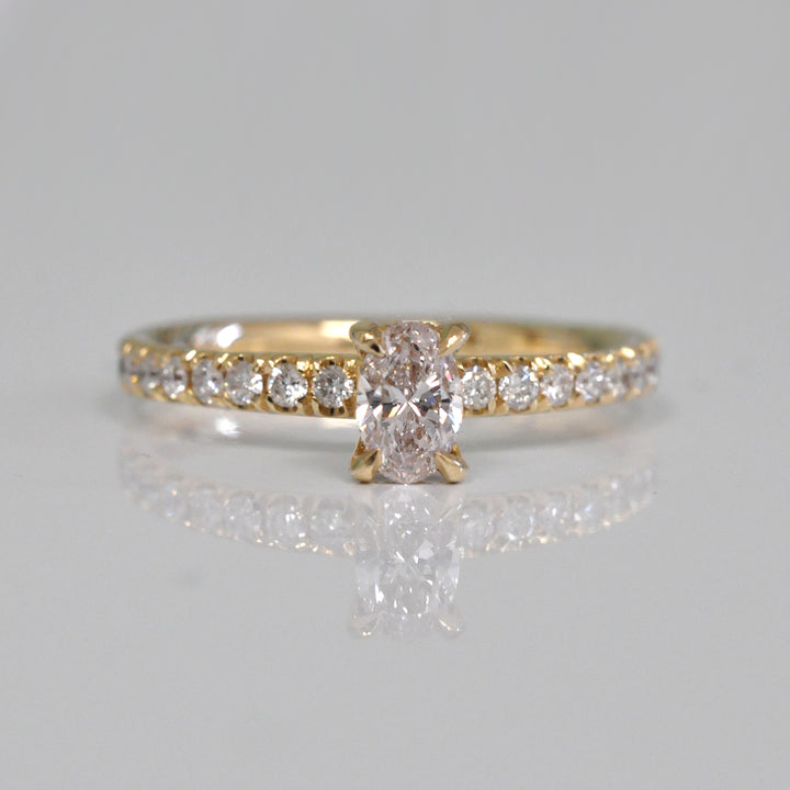 0.30 ct faint pink oval diamond yellow gold engagement ring