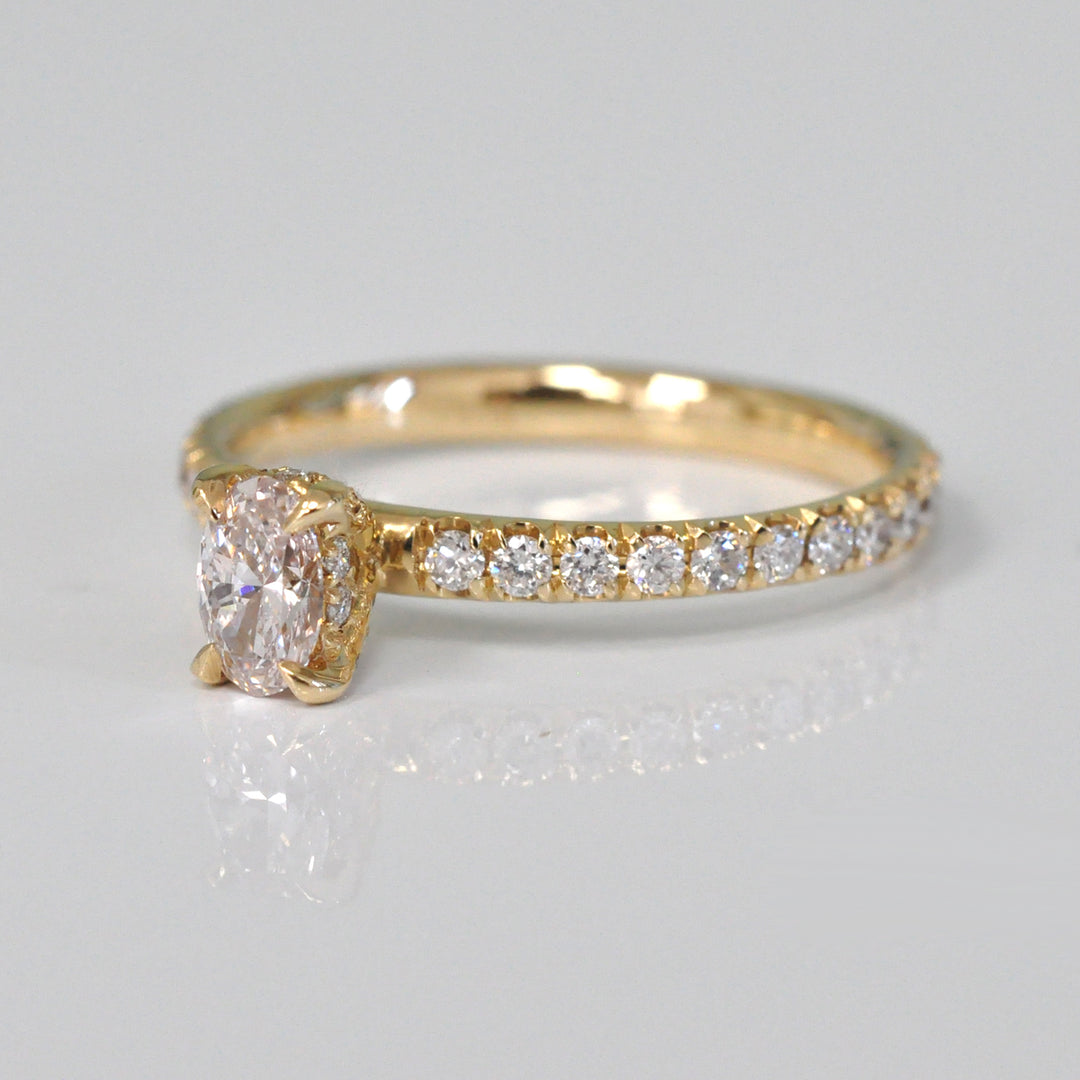 0.30 ct faint pink oval diamond yellow gold engagement ring