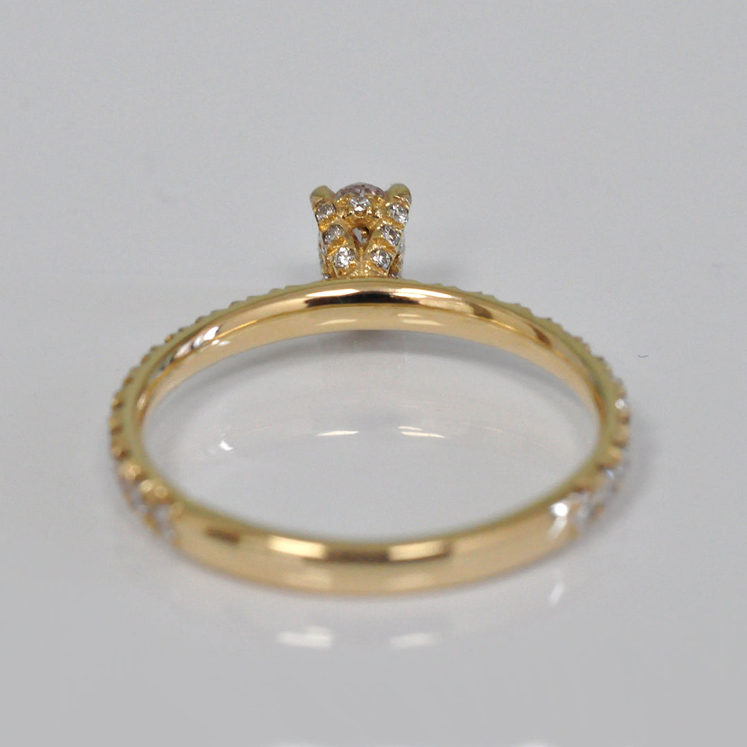 0.30 ct faint pink oval diamond yellow gold engagement ring