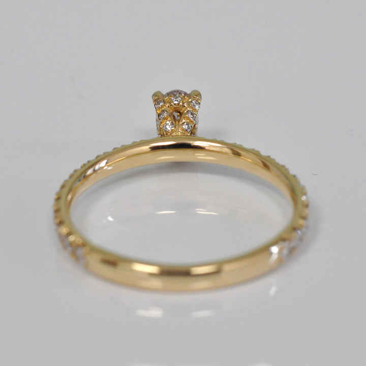 0.30 ct faint pink oval diamond yellow gold engagement ring