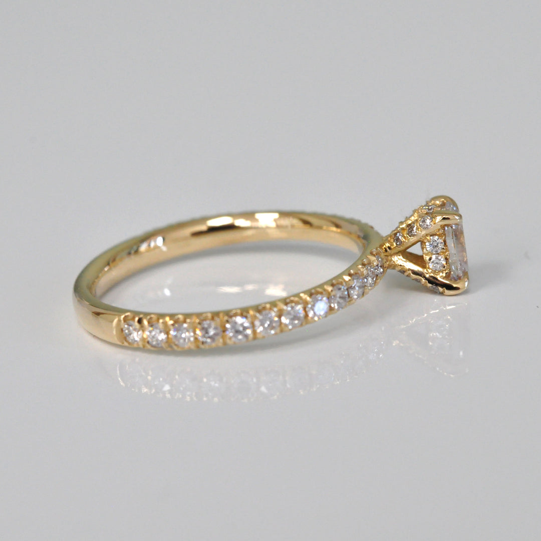 0.30 ct faint pink oval diamond yellow gold engagement ring