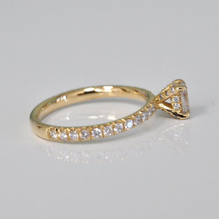 0.30 ct faint pink oval diamond yellow gold engagement ring