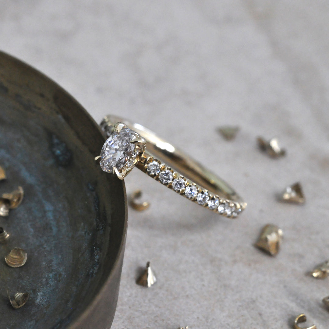 0.30 ct faint pink oval diamond yellow gold engagement ring