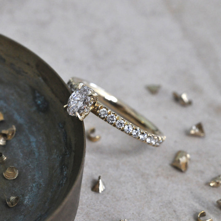 0.30 ct faint pink oval diamond yellow gold engagement ring